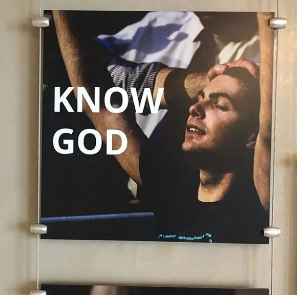 Know God church display mounted with metal standoffs